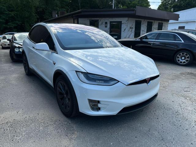TESLA MODEL X 2018 with VIN 5YJXCDE27JF136930 - Photo from auction