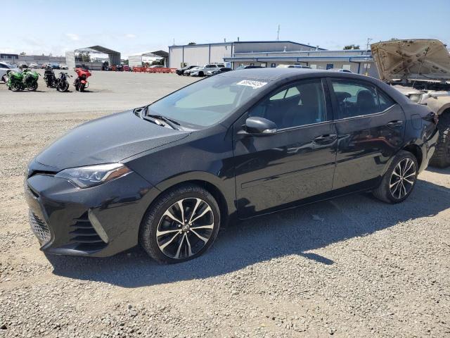 TOYOTA COROLLA L 2018 with VIN 5YFBURHE4JP816878 - Photo from auction