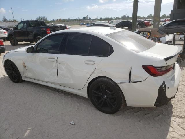 Photo 2 from auction – 2023 BMW 330I with VIN 3MW69FF0XP8D14701