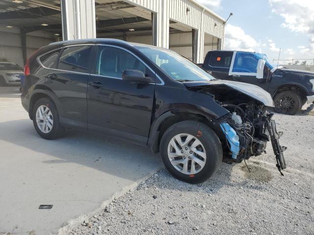 Photo 4 from auction – 2016 HONDA CR-V EXL with VIN 2HKRM4H77GH659680