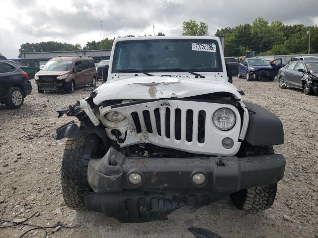 Photo 5 from auction – 2015 JEEP WRANGLER U with VIN 1C4BJWDGXFL684501