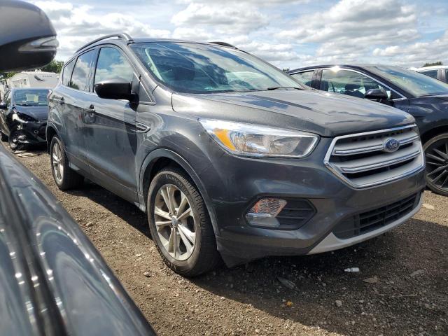 Photo 4 from auction – 2018 FORD ESCAPE SE with VIN 1FMCU0GD9JUA82908