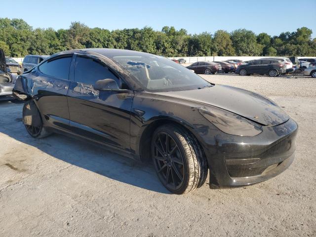 Photo 4 from auction – 2022 TESLA MODEL 3 with VIN 5YJ3E1ECXNF239829