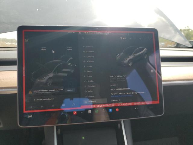 Photo 9 from auction – 2021 TESLA MODEL Y with VIN 5YJYGDEE9MF063387