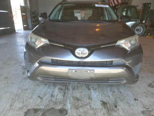 Photo 5 from auction – 2017 TOYOTA RAV4 LE with VIN JTMZFREV0HJ709547