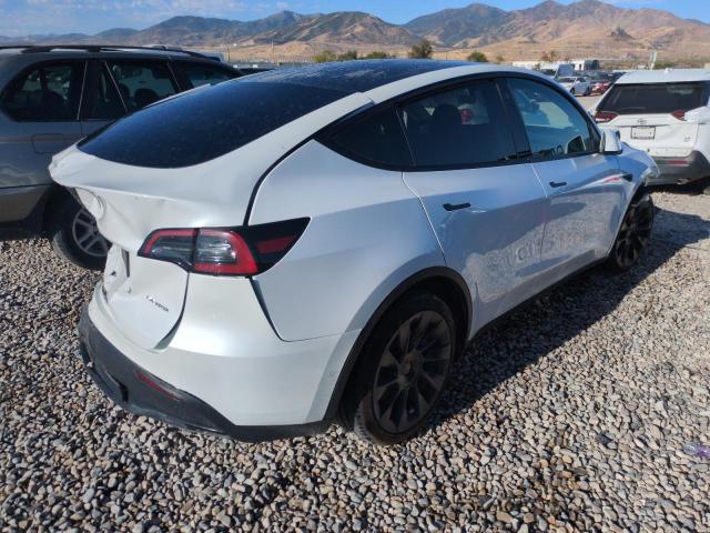 Photo 3 from auction – 2023 TESLA MODEL Y with VIN 7SAYGAEE7PF584467