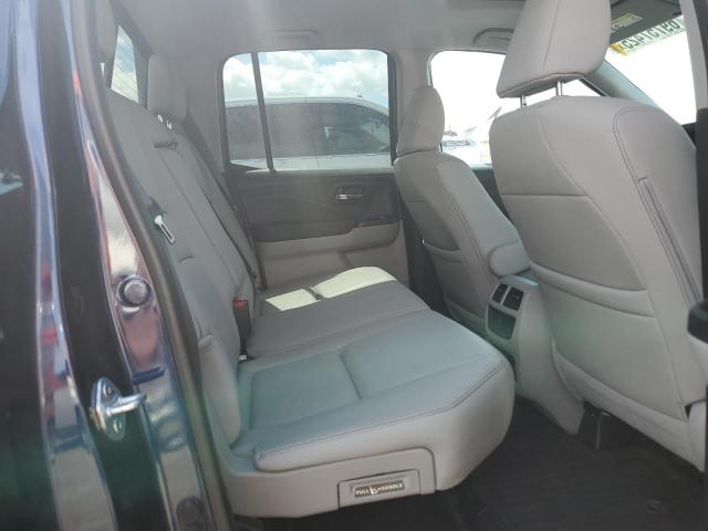 Photo 10 from auction – 2023 HONDA RIDGELINE with VIN 5FPYK3F74PB052561