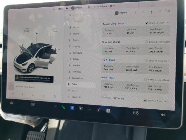 Photo 9 from auction – 2021 TESLA MODEL Y with VIN 5YJYGDEE1MF146506