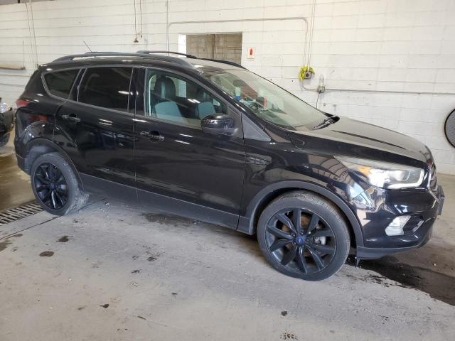 Photo 4 from auction – 2017 FORD ESCAPE SE with VIN 1FMCU9G91HUE73559