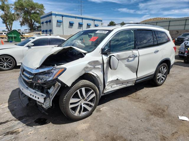 Photo 1 from auction – 2018 HONDA PILOT TOUR with VIN 5FNYF6H98JB054611