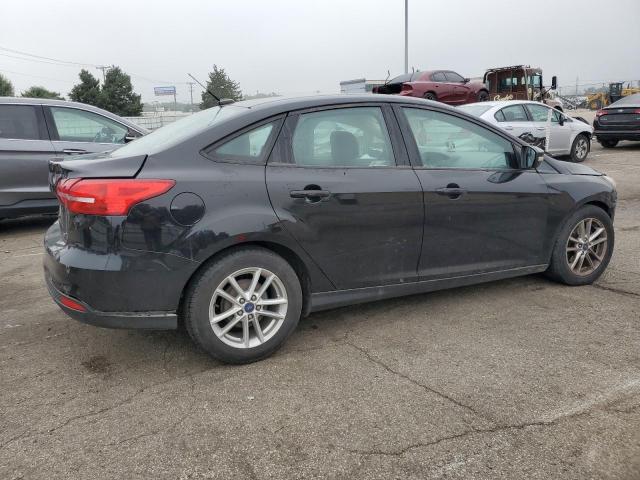 Photo 3 from auction – 2016 FORD FOCUS SE with VIN 1FADP3F28GL348974