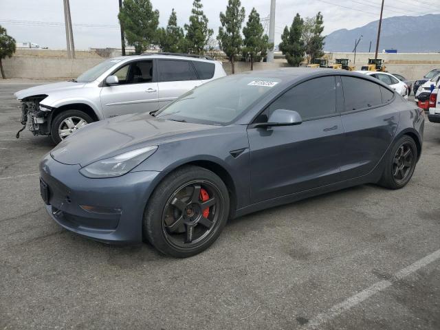 TESLA MODEL 3 2022 with VIN 5YJ3E1EC6NF164580 - Photo from auction