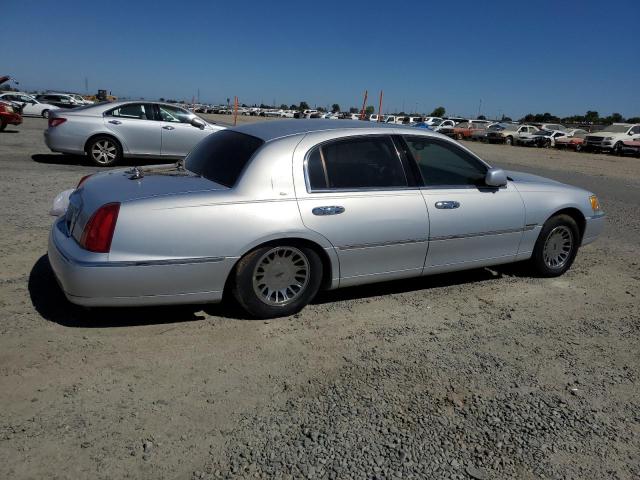 Photo 3 from auction – 2002 LINCOLN TOWN CAR with VIN 1LNHM83W92Y609433