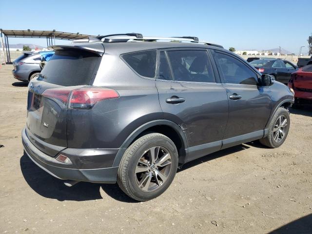 Photo 3 from auction – 2016 TOYOTA RAV4 XLE with VIN JTMWFREV3GJ083140