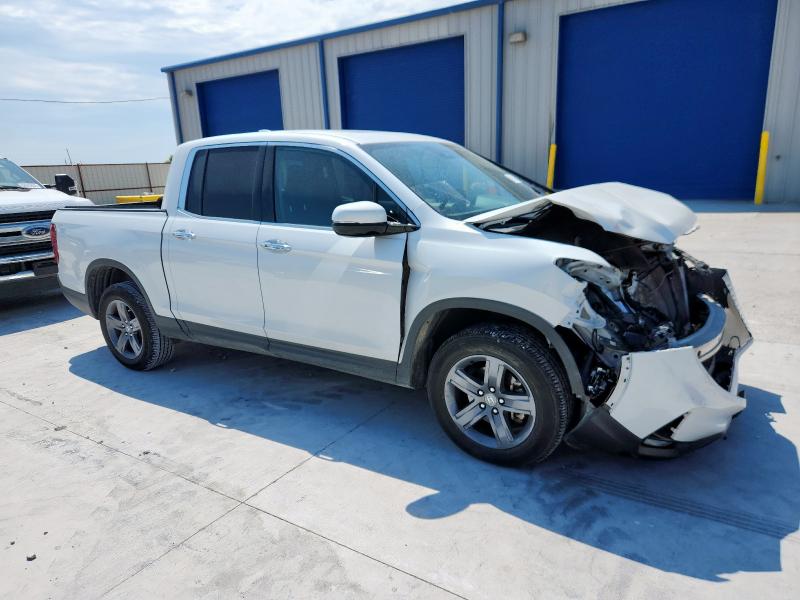 Photo 4 from auction – 2021 HONDA RIDGELINE with VIN 5FPYK3F71MB019738