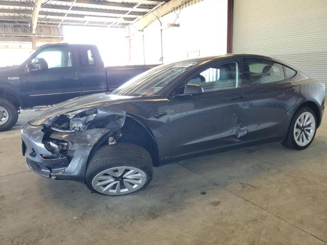TESLA MODEL 3 2022 with VIN 5YJ3E1EB7NF208948 - Photo from auction