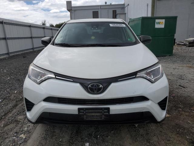 Photo 5 from auction – 2018 TOYOTA RAV4 LE with VIN JTMBFREV4JD250125