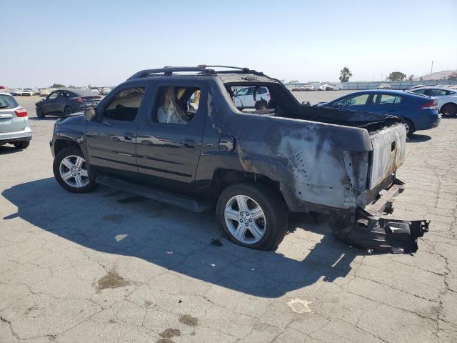 Photo 2 from auction – 2011 HONDA RIDGELINE RTL with VIN 5FPYK1F54BB004778