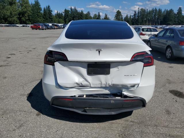 Photo 6 from auction – 2023 TESLA MODEL Y with VIN 7SAYGAEE4PF896424