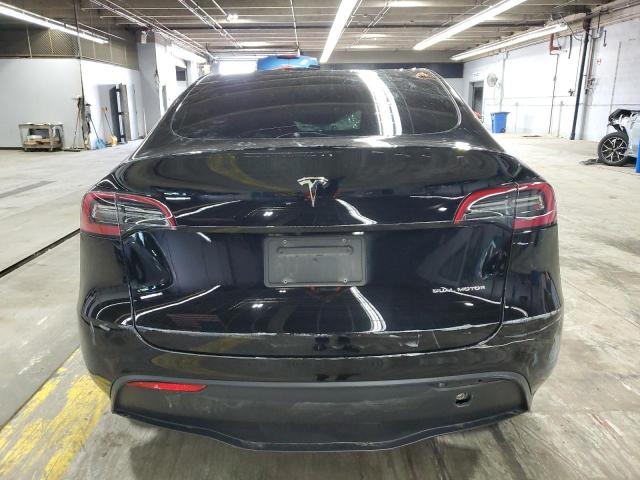Photo 6 from auction – 2023 TESLA MODEL Y with VIN 7SAYGDEE1PF694769