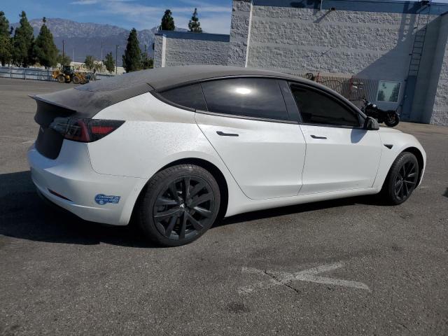 Photo 3 from auction – 2021 TESLA MODEL 3 with VIN 5YJ3E1EA6MF017690
