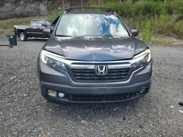 Photo 5 from auction – 2018 HONDA RIDGELINE with VIN 5FPYK3F67JB010920