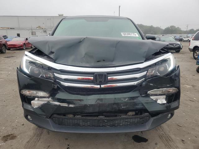 Photo 5 from auction – 2016 HONDA PILOT EXL with VIN 5FNYF6H57GB020178