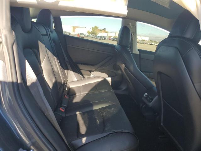 Photo 10 from auction – 2021 TESLA MODEL 3 with VIN 5YJ3E1EC0MF050797