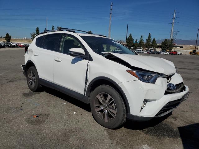 Photo 4 from auction – 2016 TOYOTA RAV4 XLE with VIN JTMWFREV9GD085148
