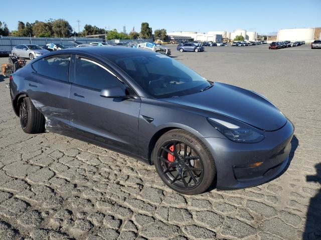 Photo 4 from auction – 2021 TESLA MODEL 3 with VIN 5YJ3E1EC0MF050797