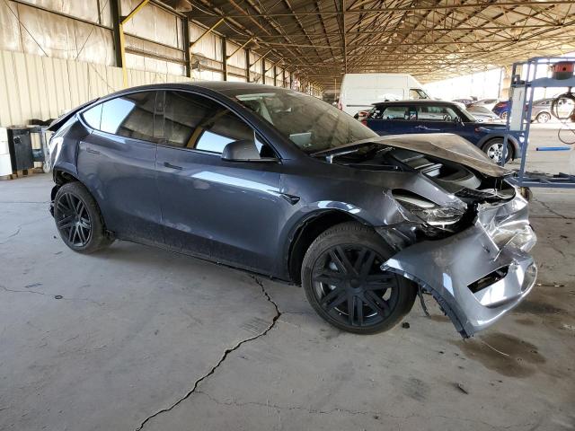Photo 4 from auction – 2023 TESLA MODEL Y with VIN 7SAYGAEEXPF832176