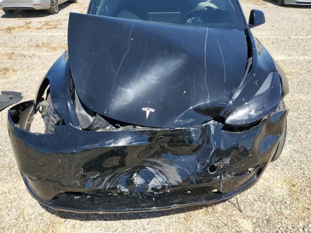 Photo 11 from auction – 2023 TESLA MODEL Y with VIN 7SAYGAEE4PF897802