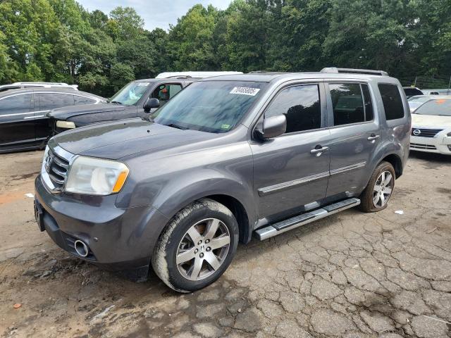 HONDA PILOT TOUR 2012 with VIN 5FNYF4H92CB011406 - Photo from auction