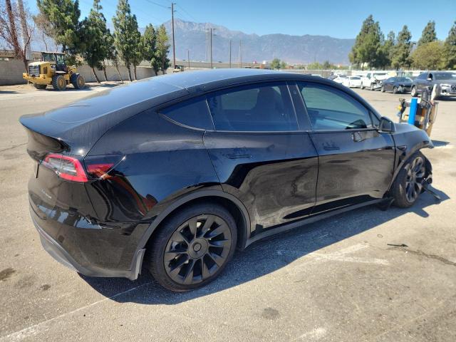 Photo 3 from auction – 2022 TESLA MODEL Y with VIN 7SAYGAEE4NF559698