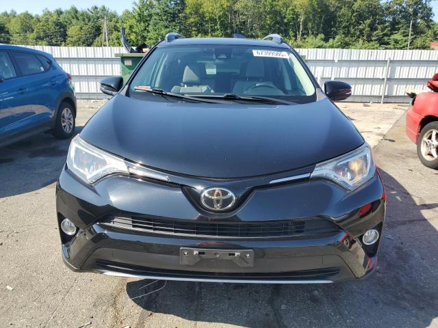 Photo 5 from auction – 2017 TOYOTA RAV4 XLE with VIN 2T3RFREVXHW560145