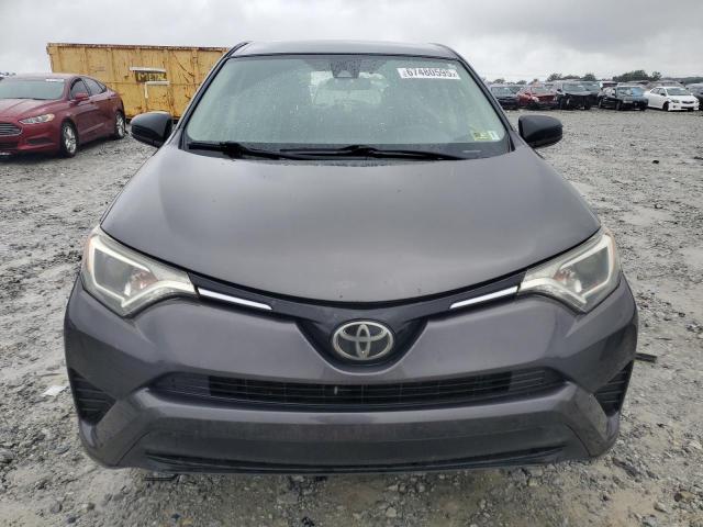 Photo 5 from auction – 2018 TOYOTA RAV4 LE with VIN JTMBFREV5JJ720535