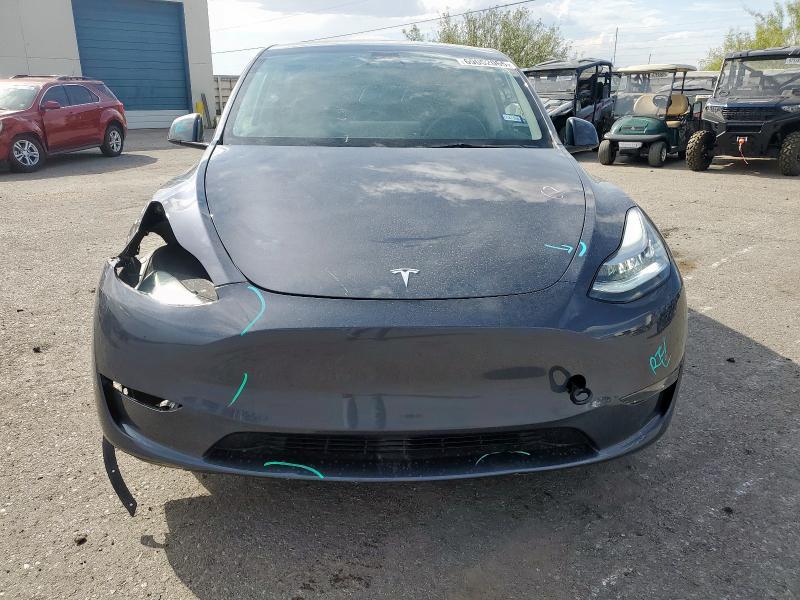 Photo 5 from auction – 2023 TESLA MODEL Y with VIN 7SAYGDEE0PA088487