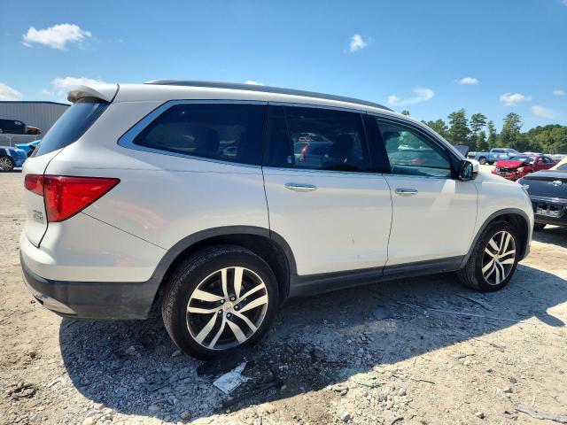 Photo 3 from auction – 2016 HONDA PILOT ELITE with VIN 5FNYF6H05GB106559