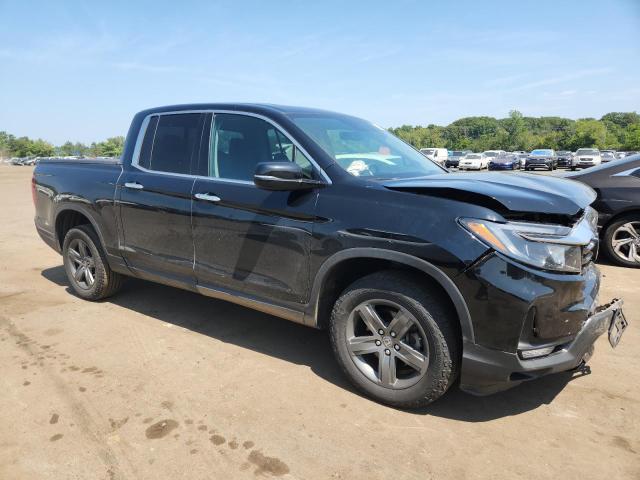 Photo 4 from auction – 2023 HONDA RIDGELINE with VIN 5FPYK3F77PB044745