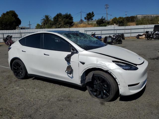 Photo 4 from auction – 2022 TESLA MODEL Y with VIN 7SAYGAEE7NF429785