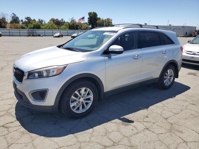 KIA SORENTO LX 2016 with VIN 5XYPG4A35GG044347 - Photo from auction