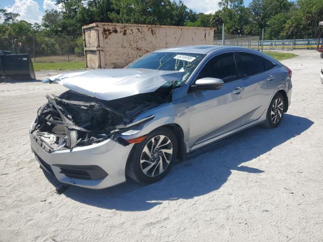 HONDA CIVIC EX 2017 with VIN 19XFC2F77HE066159 - Photo from auction