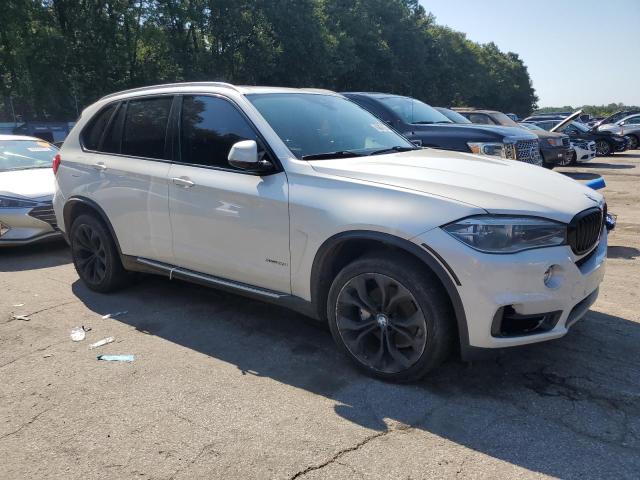 Photo 4 from auction – 2014 BMW X5 SDRIVE3 with VIN 5UXKR2C50E0C00385