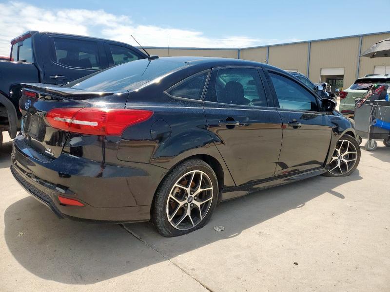 Photo 3 from auction – 2016 FORD FOCUS SE with VIN 1FADP3F23GL324436