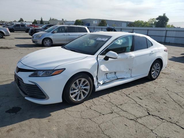 TOYOTA CAMRY LE 2022 with VIN 4T1C11AK2NU690507 - Photo from auction