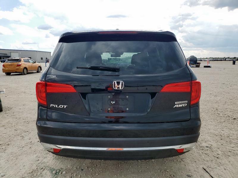 Photo 6 from auction – 2017 HONDA PILOT TOUR with VIN 5FNYF6H90HB009057