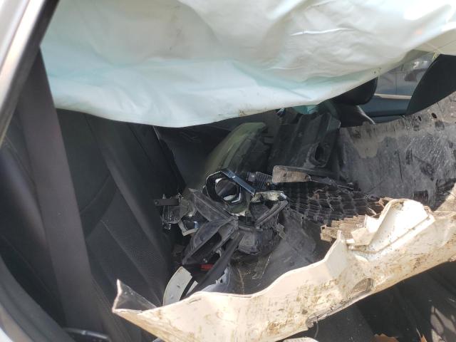 Photo 13 from auction – 2015 NISSAN ROGUE S with VIN 5N1AT2MV7FC820673