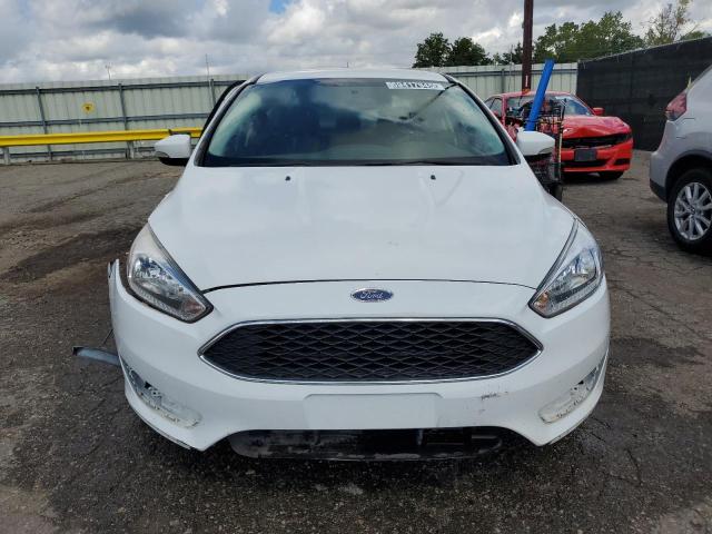 Photo 5 from auction – 2016 FORD FOCUS SE with VIN 1FADP3F25GL229635