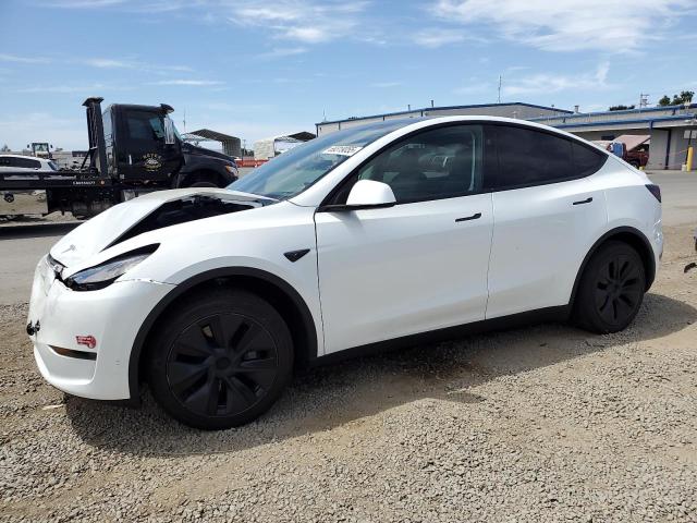 TESLA MODEL Y 2024 with VIN 7SAYGDED8RF117912 - Photo from auction