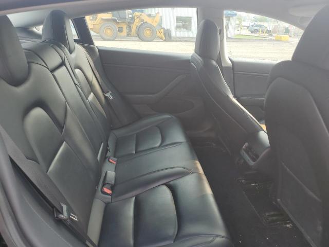 Photo 10 from auction – 2019 TESLA MODEL 3 with VIN 5YJ3E1EA3KF329320